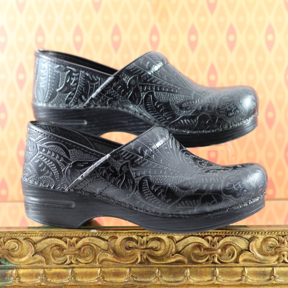 Dansko Black Leather Tooled Clogs